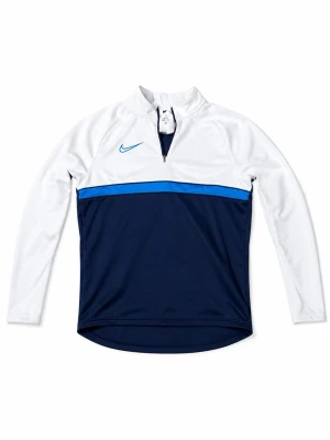 Nike Dri-FIT träningströja blå/vit - Äkta Nike Dri-FIT långärmad träningströja i vitt och marinblått med blå detalj över bröstet. Tröjan har halv dragkedja framtill och är tillverkad i ett snabbtorkande funktionsmaterial som passar perfekt till träning och sport.