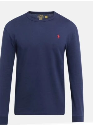 Marinblå långärmad topp från Polo Ralph Lauren - Snygg marinblå långärmad topp från Polo Ralph Lauren med klassisk rund halsringning och ikonisk röd broderad logga på bröstet. Tillverkad i mjuk bomull som känns skön mot huden. Perfekt för en stilren och avslappnad look. Tveka inte att fråga om bilder, obs det är fast pris 