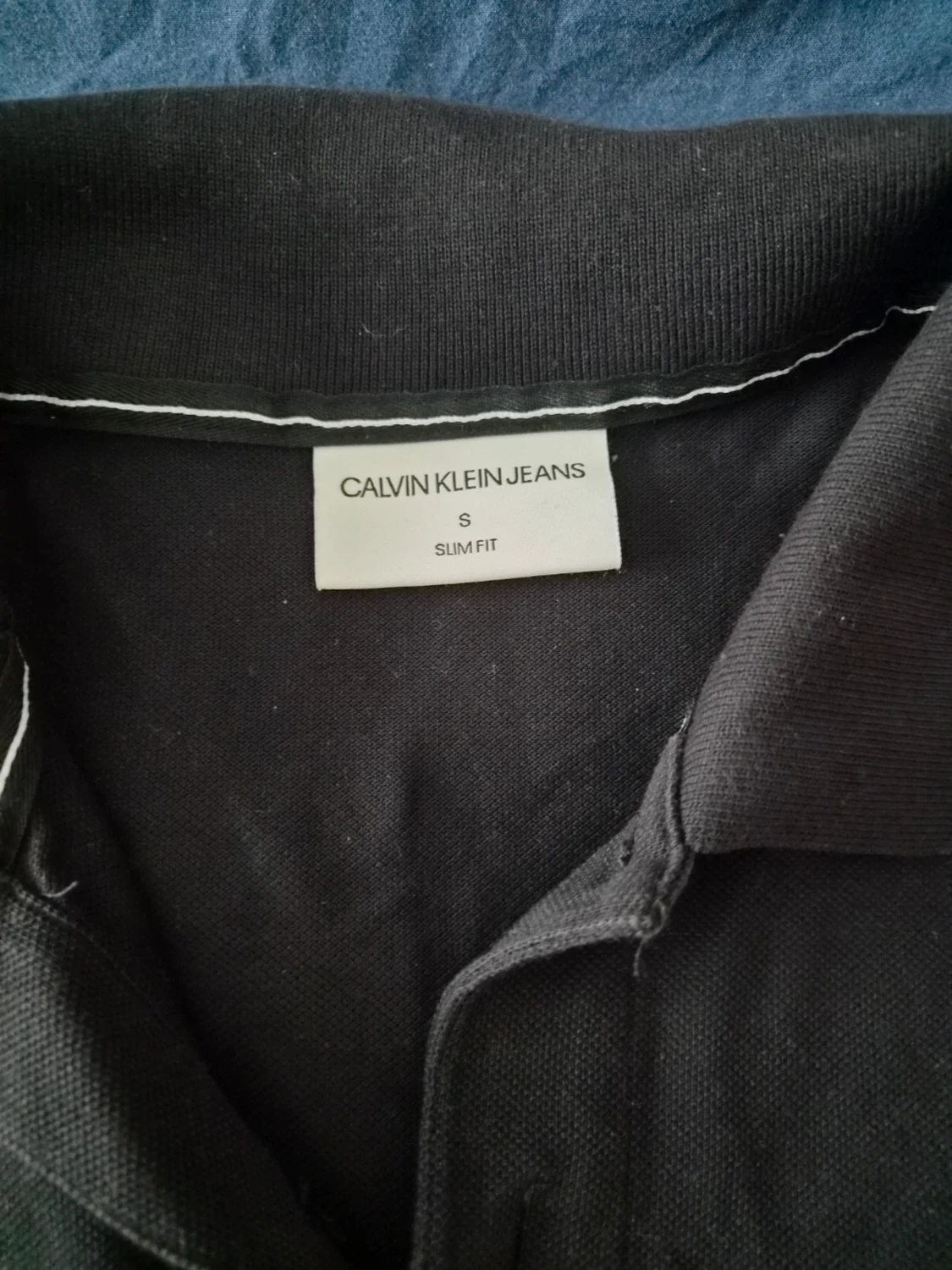 Svart pikétröja från Calvin Klein Jeans - 1