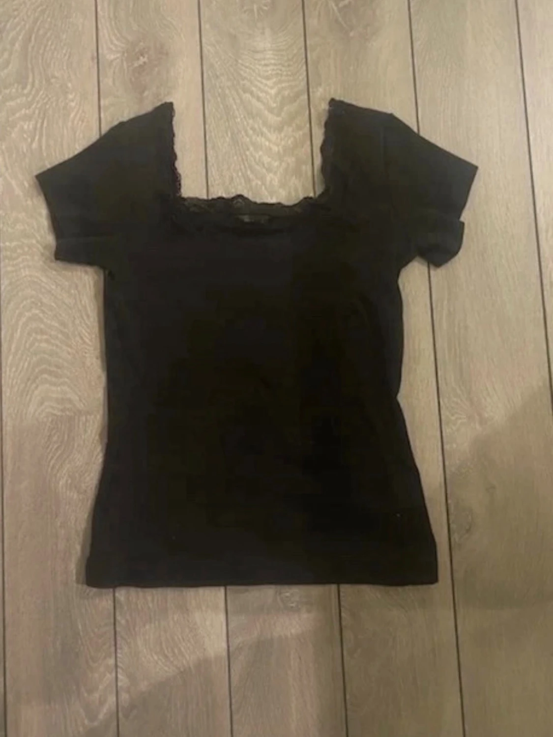 Svart topp med spets från Filippa K