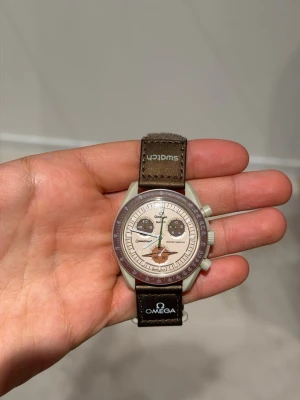 Omega Saturnus klocka  - Otroligt fint skick- nästan helt oanvänd. Köpt på merchsweden men kvitto är borttappat. 