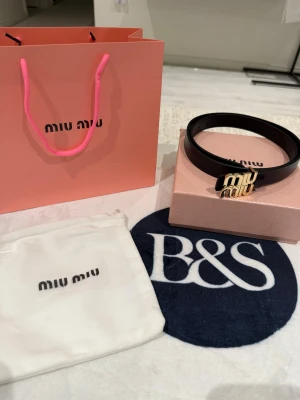 Miu Miu | Black belt 105cm - Size is 105cm and condition just as new. Please send an offer :) ✅ Perfect condition  – Brand new, never worn  💯 100% Authentic products only 📦 Fast shipping ♻️ Shop sustainably, look sharp.  REMINDER: Items can be used and please note that we only resell used clothes we buy online (some are brand new).   We will always tell our customers before buying if item has stains or is damaged. Returning is always possible  Bought in here. If you have anything authentic to sell, let us know because we als