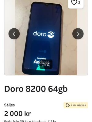 Doro 8200 Android 64GB blå - Säljer en Doro 8200 Android-telefon med 64GB lagring. Telefonen har en snygg mörkblå baksida, rundade hörn och en stor skärm med droppformad sensor. Perfekt för dig som vill ha en enkel och användarvänlig smartphone med tydliga knappar och modern design.