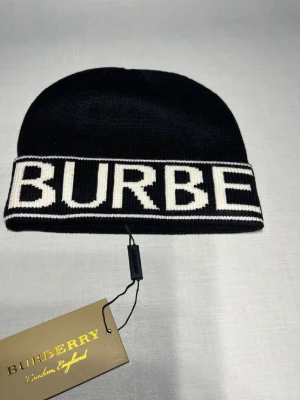 B mössa - Fin mössa