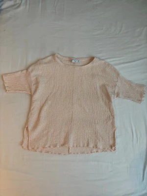 Ljusrosa topp från Mango - En ljusrosa topp från Mango.
