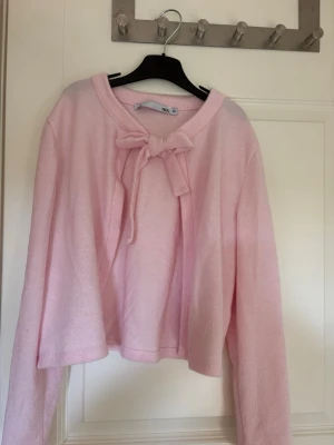 Rosa kofta - En rosa kofta från lager 157 i stl xs