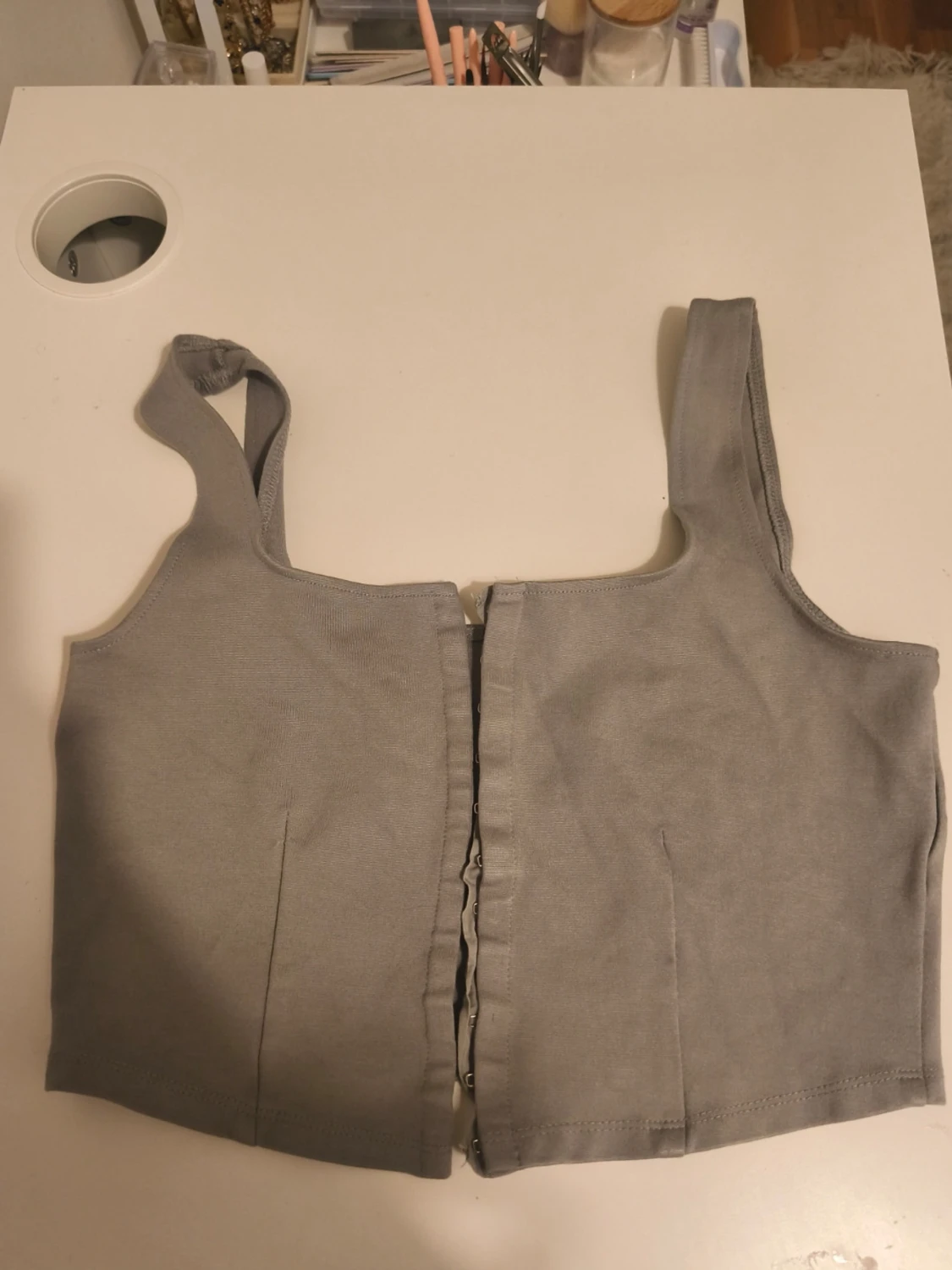 Grå croppad linnetopp med dragkedja