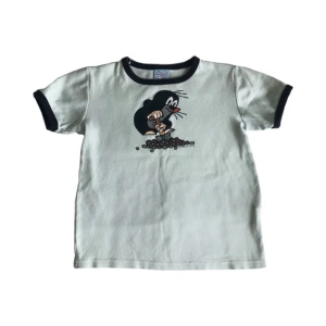 Vintage graphic topp/ T-shirt med tryck/ print, 70tal/ 70s/ 1970tal/ 1970s - Supersöt unik ljusblå topp! 100% bomull, Ser ut att vara från 70talet, barntröja men passar ca upp till M som en croptop