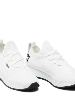 Vita sneakers från HUGO - Stilrena vita sneakers från HUGO med stickad ovandel och tjock vit sula. Skorna har elastiska snören och svart detalj vid hälen. Perfekta för en clean och modern look.