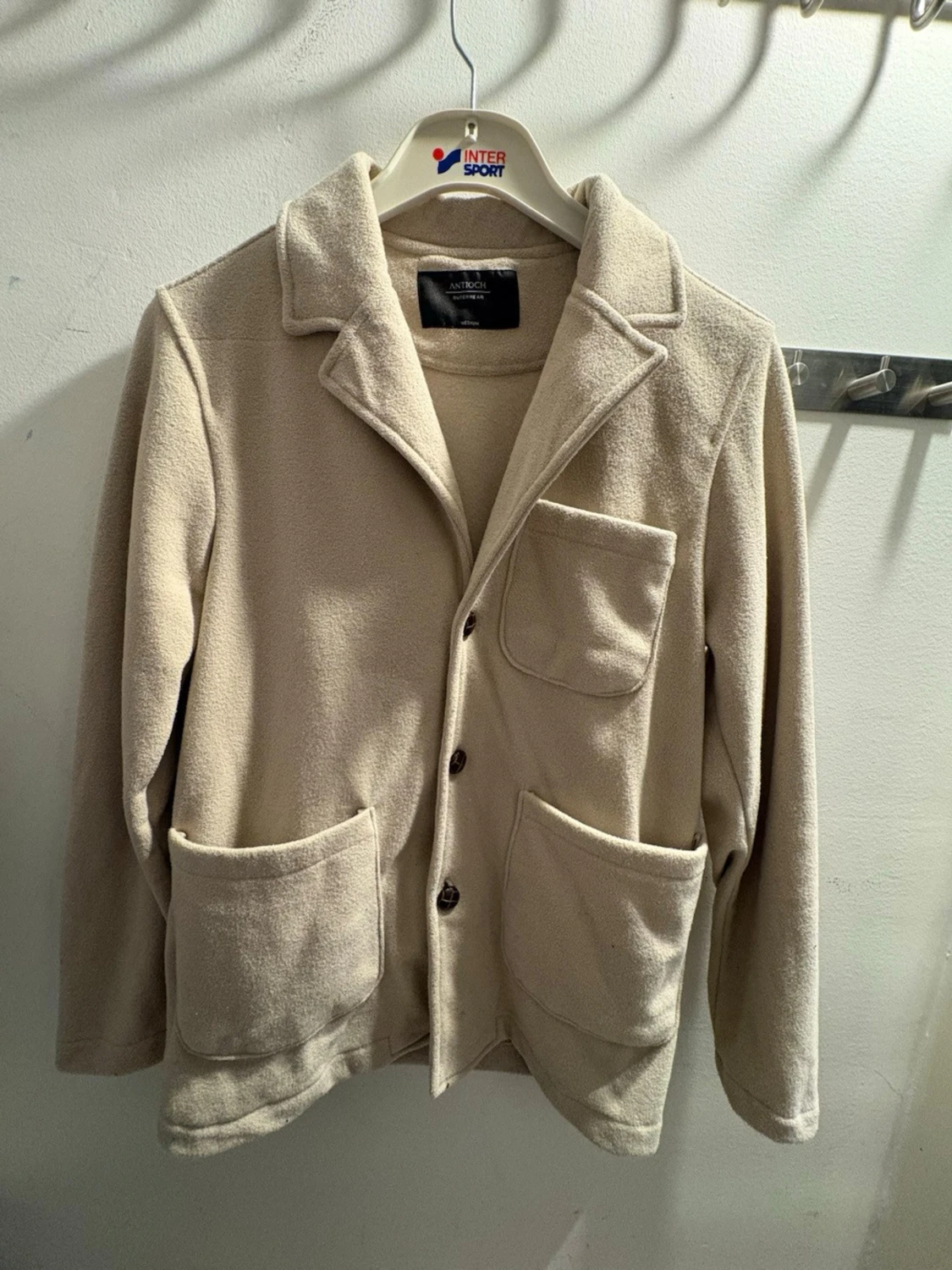 Beige fleece cardigan med fickor