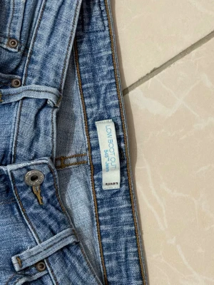 Levi's ljusblå bootcut jeans - Lågmidjade Levi's 545 Low Bootcut jeans 
