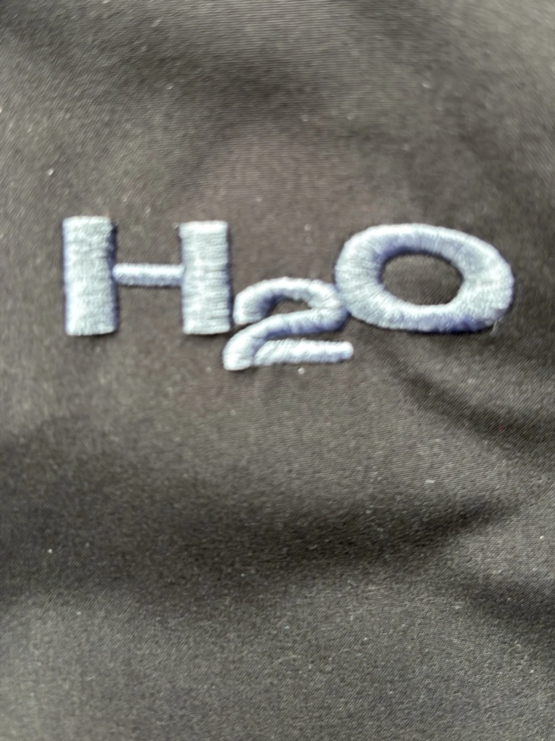 Svart regnjacka från H2O med huva - 1