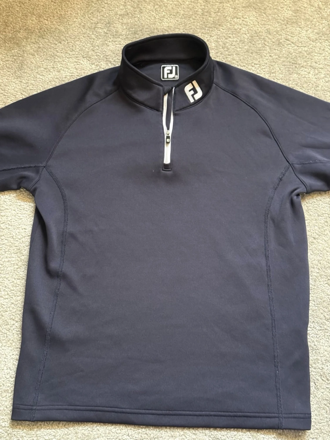 Mörkblå ziptröja från FootJoy