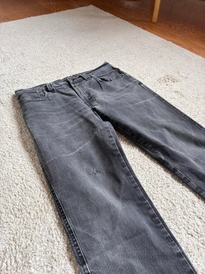 Nudie jeans grey slim/straight fit 31/32 - Nudie Jeans – Grey – Slim Straight Fit – Beautiful Fades - 31/32  Authentic Nudie Jeans in a clean grey wash with a Slim Straight Fit. Features beautiful natural fades for the perfect worn-in look.  ✔️ Authentic Nudie Jeans ✔️ Slim Straight Fit ✔️ Grey wash ✔️ Great condition ✔️ Beautiful natural   Open to reasonable offers – I can  lower the price a little for a smooth and quick deal.  📦 Orders placed before 4 PM are shipped the same day.