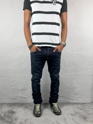 Nudie jeans  - Ett par riktigt snygga jeans från Nudie i storlek W30 L34 i modellen Tight Long John