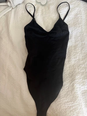 Svart body - Svart body