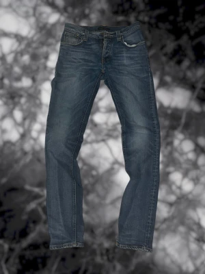 Nudie Jeans Grim Tim - Säljer ett par Nudie Jeans i modellen Grim Tim. Storlek W34, L30, inga defekter