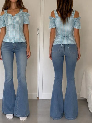 Vintage topp  - Super söt rutig topp, fint skick bortsett från en lätt missfärgning vid ärmen, tror de går bort med rätt rengöringsmedel, 