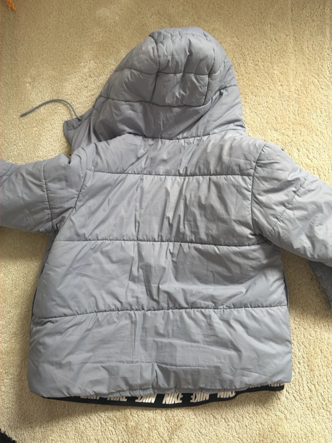 Ljusblå pufferjacka från Nike - 1