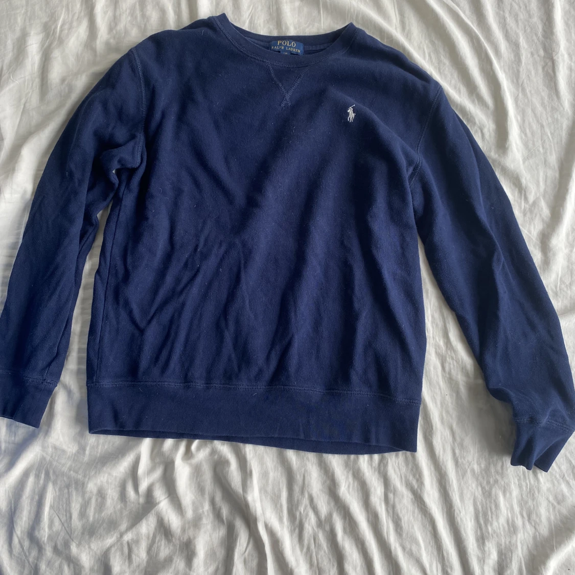 Marinblå tjocktröja - 90