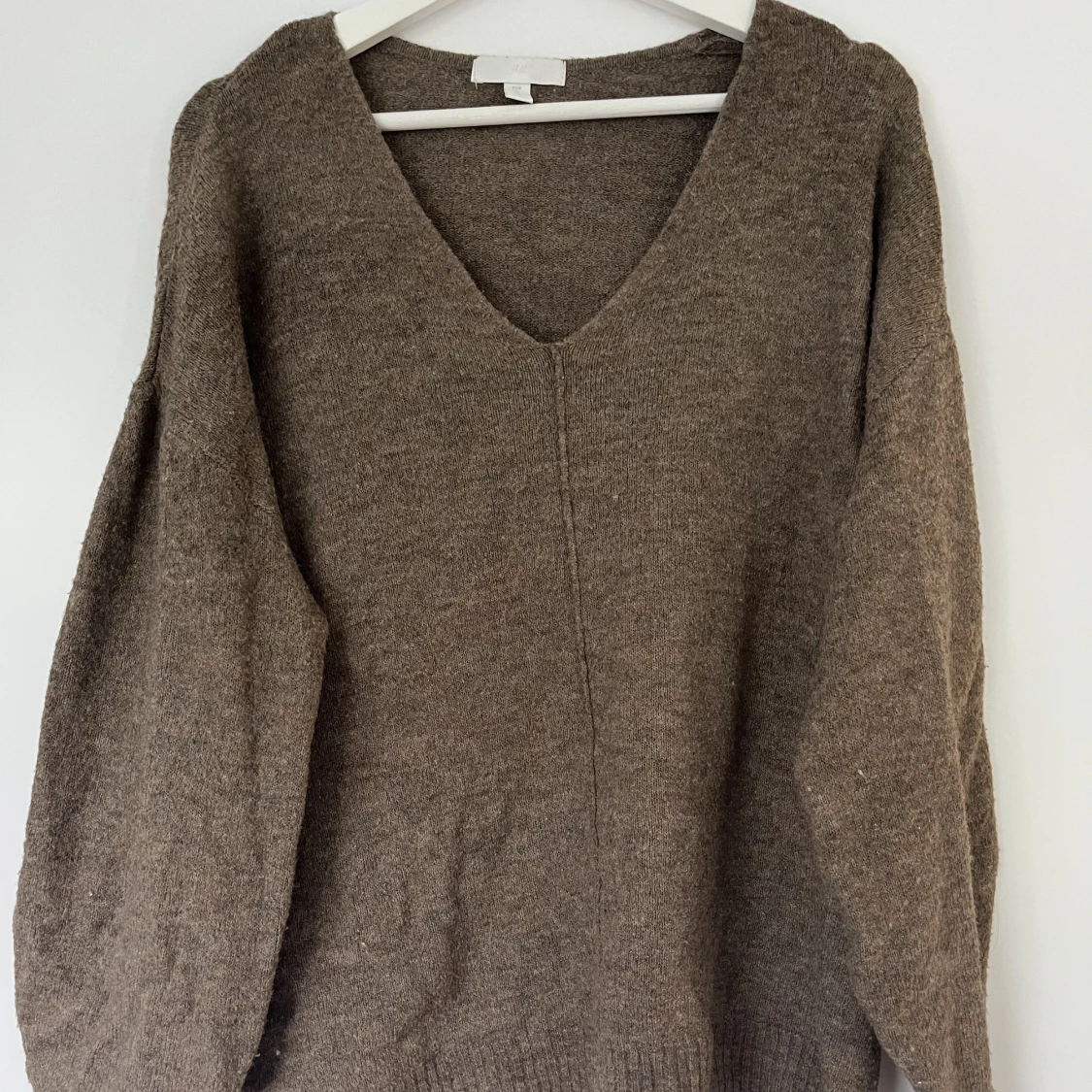 Stickad V ringad tröja