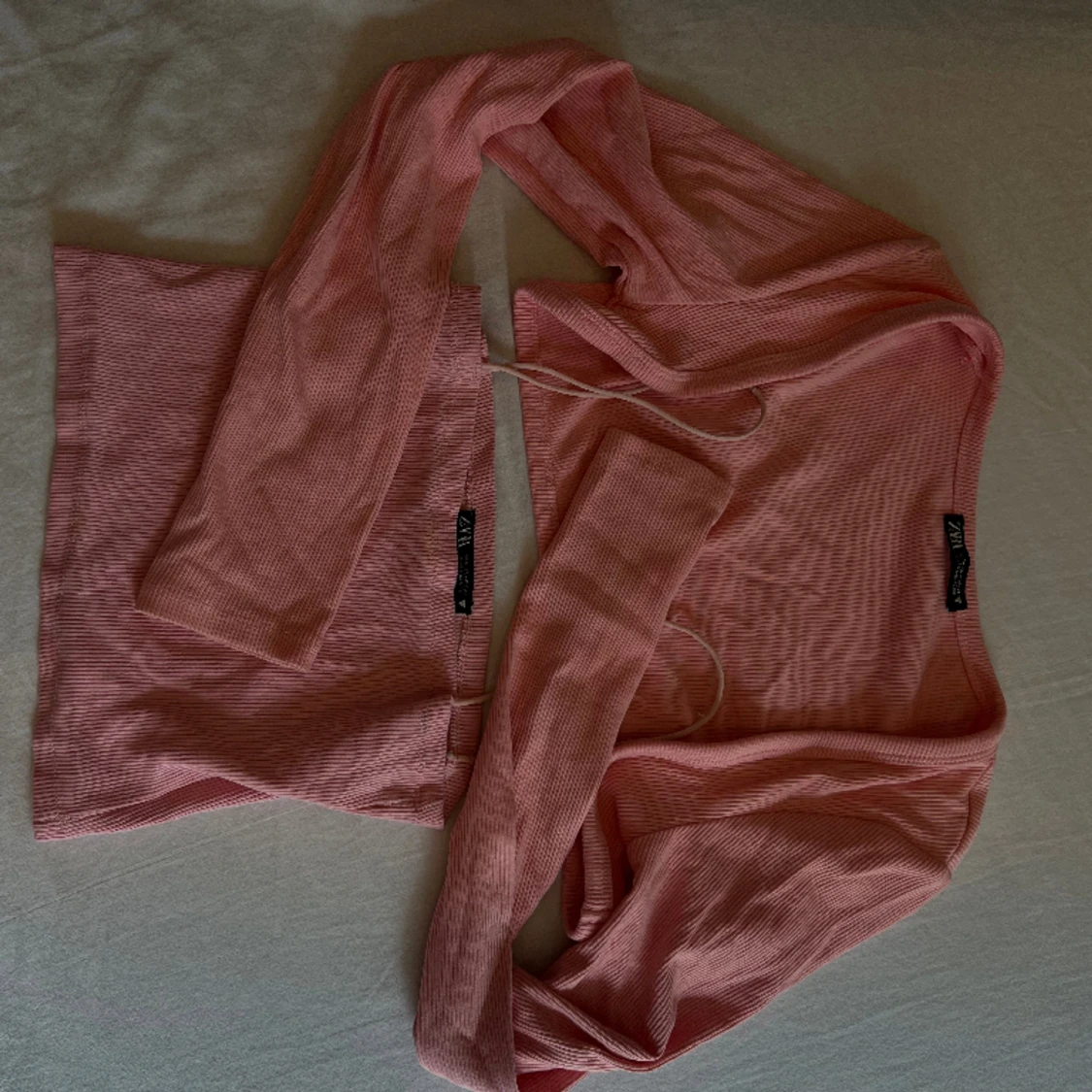 Rosa topp med armvärmare  - 91