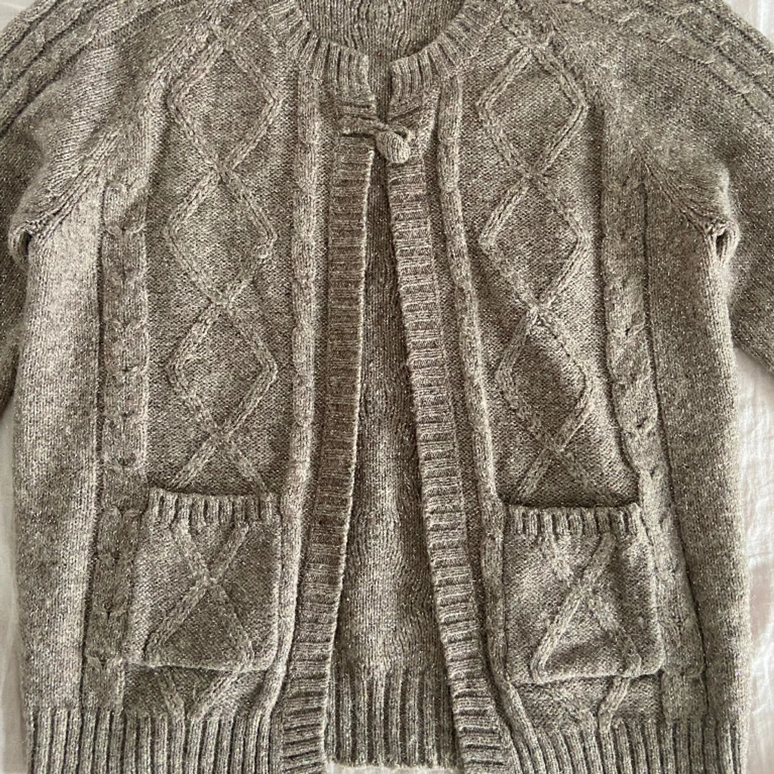 Glittrig kofta  - 90