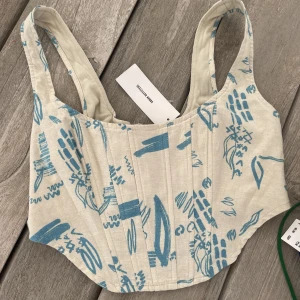 Corset topp - Korsett topp från Urban outfitters 💕 Aldrig använd - prislappen kvar. Strl XS