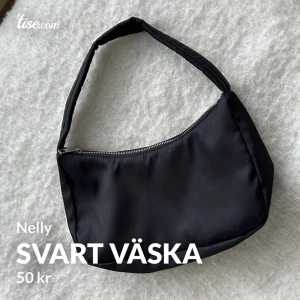 Svart handväska  - Svart handväska från Nelly. Använd 1 gång
