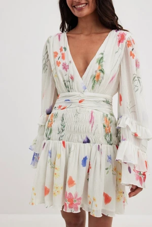 Klänning Sanna Jörnvik X NAKD EU 34 - Ny med lappar  EU34.  Klänning finns kvar så länge annons finns kvar. Fråga inte om den finns kvar. 