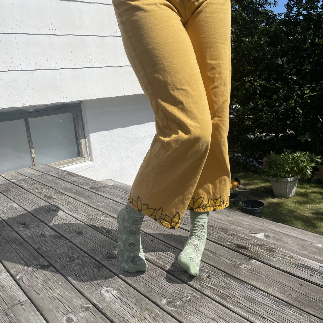 Byxor med solrosmönster  - 90