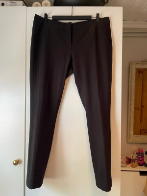 Byxor - Ett par svarta byxor från STOCKH LM. Storlek: 44. Lite använda. 