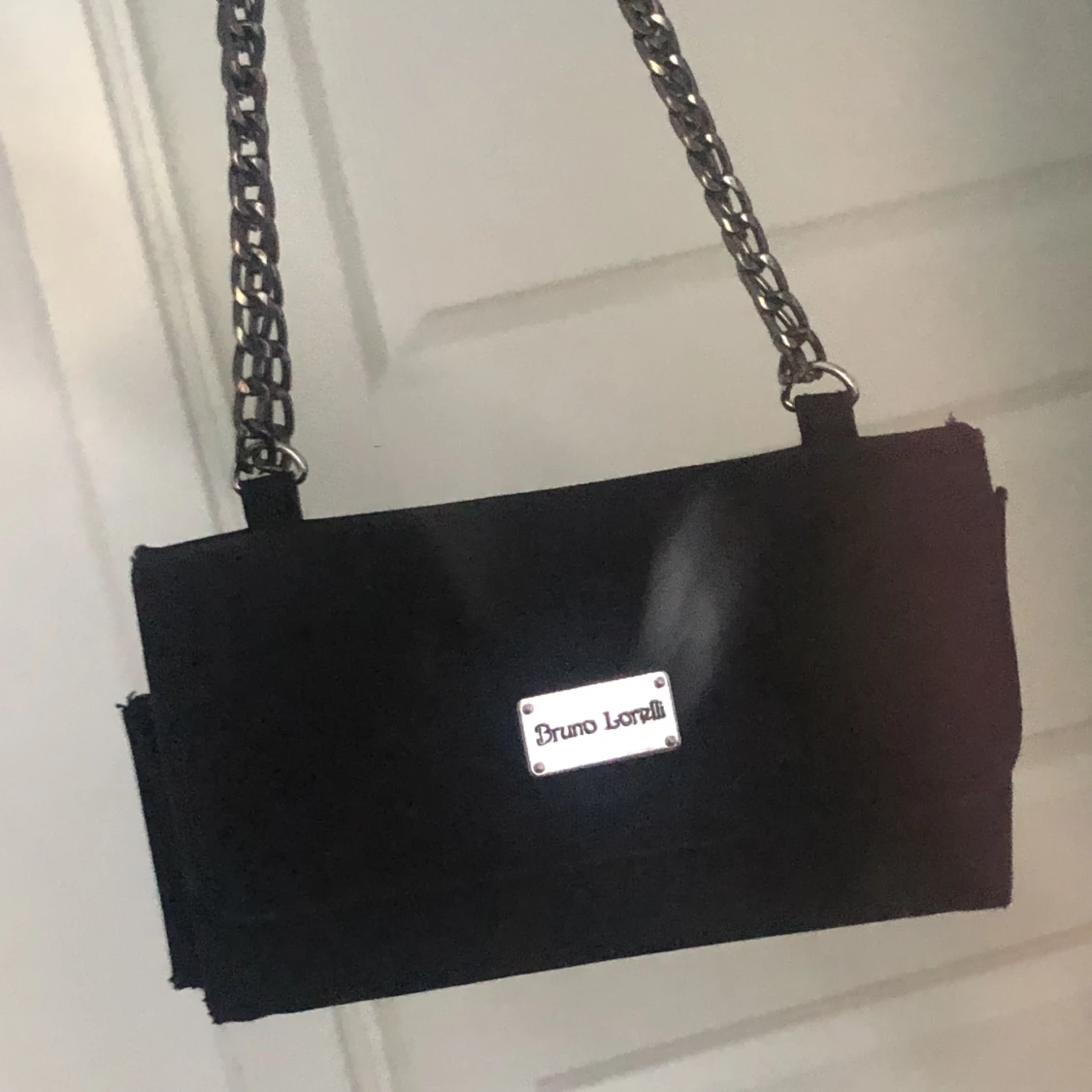 Liten axelremsväska 