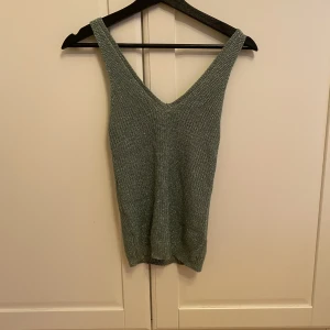 Festtopp - Grönglittrig topp, perfekt till fest. Passar XS-S.