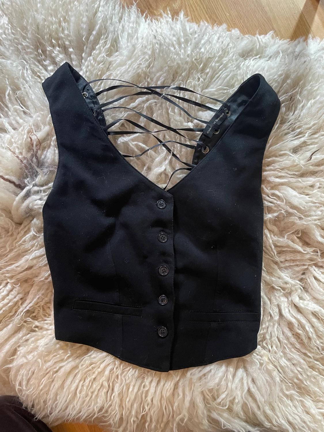 Väst med smörad rygg