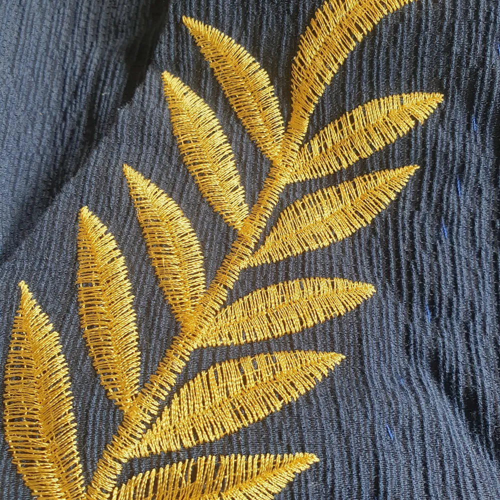 Blue longdress with details of golden. Klänningar.