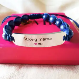 Motivational bracelet with pink jade or marine blue lazurite/lapis gemstone and surgical grade engraved steel. Comfortable fit for the active lifestyle. A daily reminder that you are strong and beautiful. New. The perfect gift.