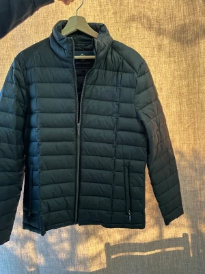 Jacka - Tunn dunjacka för vår/höst