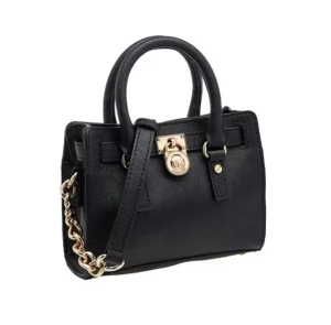 Väska - Snygg svart Michael kors väska i svårt och guld. Använd fåtal gånger