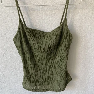 Linne - Grönt linne, köpt på secondhand i Spanien