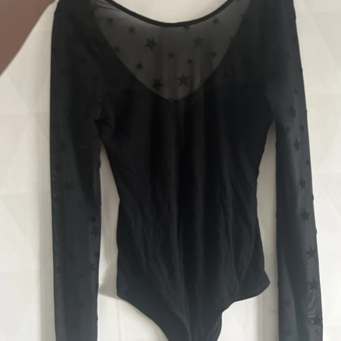 Meshbody med stjärnor