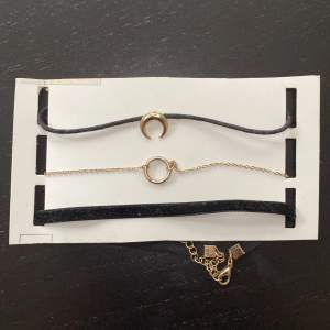 3 stylish black and gold chokers in great condition 