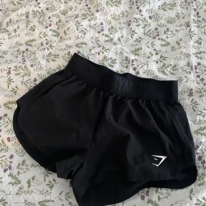 Gymshark shorts - Gymshark training loose fit shorts. Strl Xs. Princip oanvända. Använt dem 1 gång, men säljer nu pga för små :) 