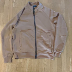 Hoodie bluewear medium - En medium hoodie av bluewear