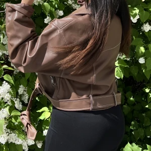 Jacka  - Använd två gånger 