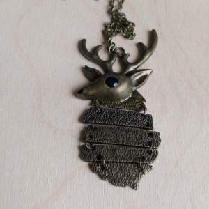 Longer chain, bronze colored deer necklace 