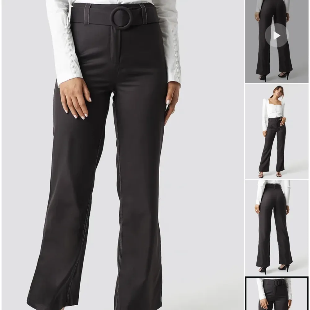 Bruna kostymbyxor med bälte framtill. Använt skick. Har vita ”outlines”. Slits nertill benet. . Jeans & Byxor.