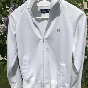 Fred Perry zip-tröja - Vit och grön Fred Perry-tröja med dragkedja