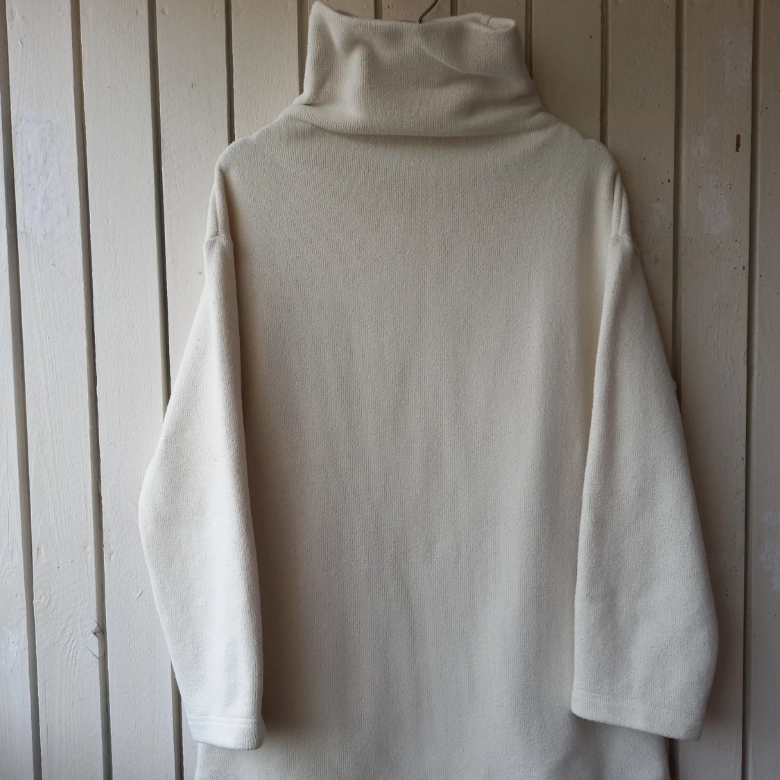 Cream Uniqlo fleece jumper