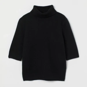 Stickad polo - Svart kortärmad stickad polo